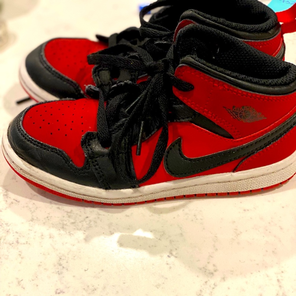 Pair of air jordan one mid. Red / black. Size 10c